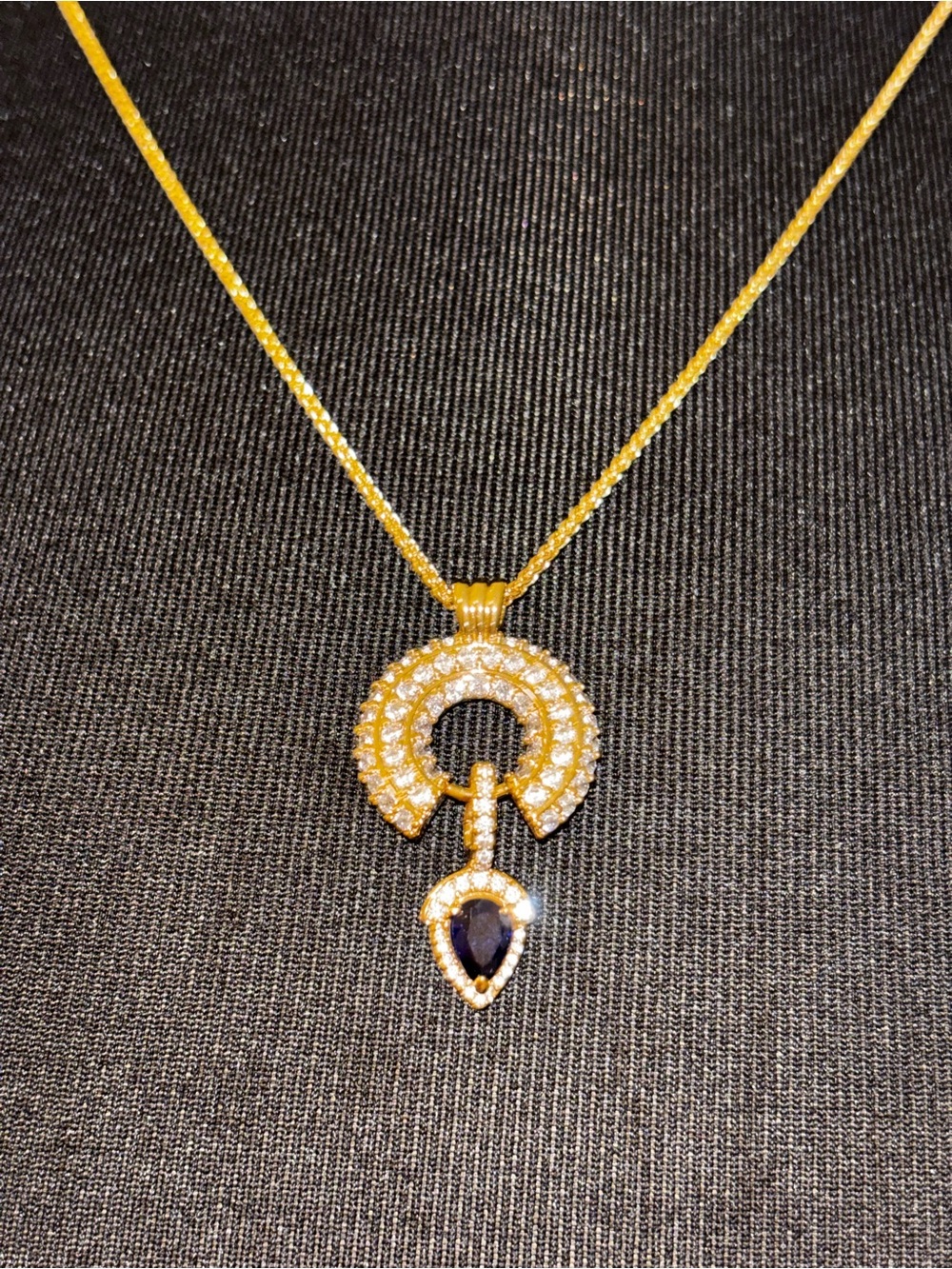 Gold-Tone Necklace with Sapphire-Blue Teardrop Pendant
